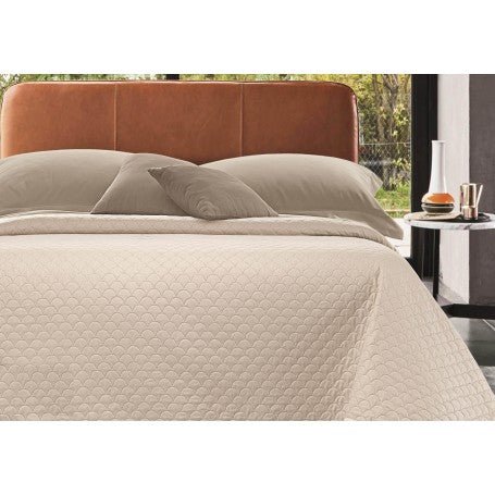 Couvre-lit pour un lit queen size