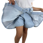 Short en jean effet jupe plissée pour fille