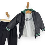 Tenue nouveau-né avec veste en éco-cuir